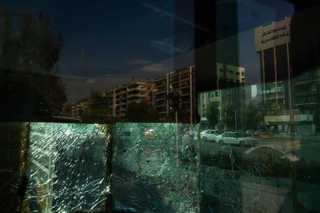 Shattered windows at the Iranian embassy in Damascus. A ll over the city are signs of the changes happening in Syria.