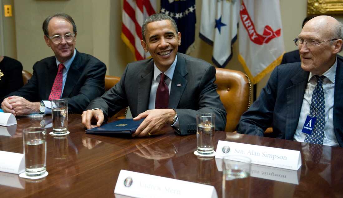 President Barack Obama speaks alongside Erskine Bowles (left) and Alan Simpson (right), co-chairs of the National Commission on Fiscal Responsibility and Reform, on April 27, 2010.