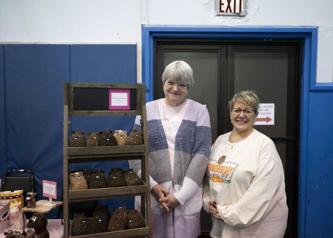 Mindy Grose (left) and Tracy McCoy selling groundhog-related crafts at the Punxsutawney Community Center.