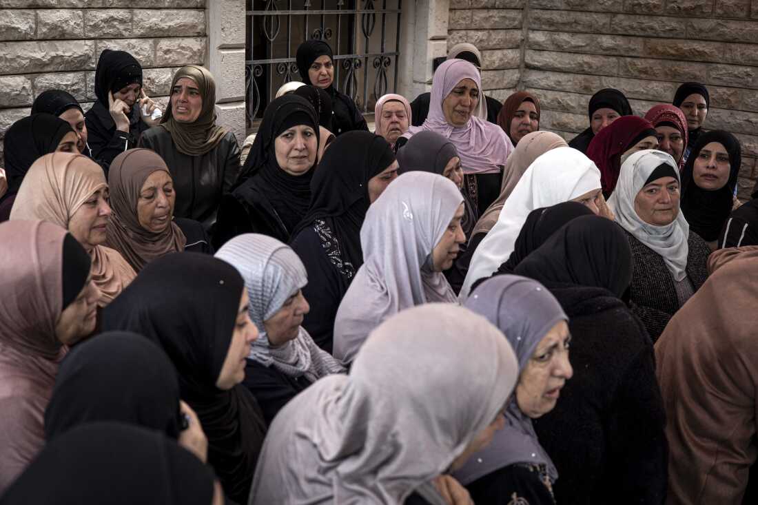 Mourners attend the funeral of 14-year-old Palestinian American Amir Rabee in the village of Turmus Ayya, in the Israeli-occupied West Bank, on Monday.