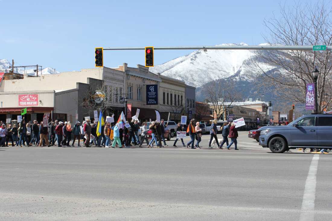 Hundreds of people join a protest in downtown Hamilton, Mont., in April supporting the work of federal employees as President Donald Trump oversees efforts to restructure the nation’s government. Federal scientific research and forestry work are part of this small town’s economic bedrock.