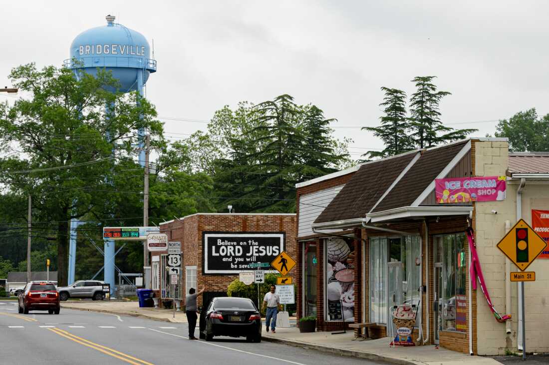 A water tower stands above downtown Bridgeville, Delaware on Wednesday, May 14, 2025. (Wesley Lapointe/ for NPR)