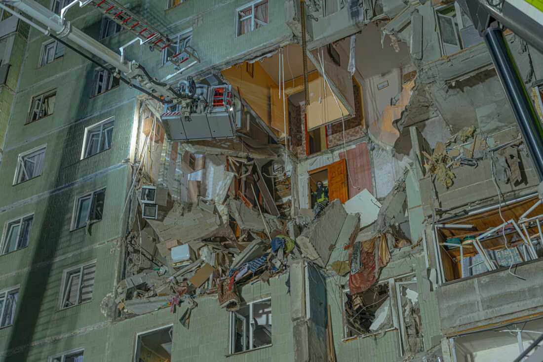 A rescue team operates on the spot after a strike by a Russian kamikaze drone Shahed in Sumy. Nine apartments were completely destroyed, 11 people killed and 14 injured on Jan 30, 2025.