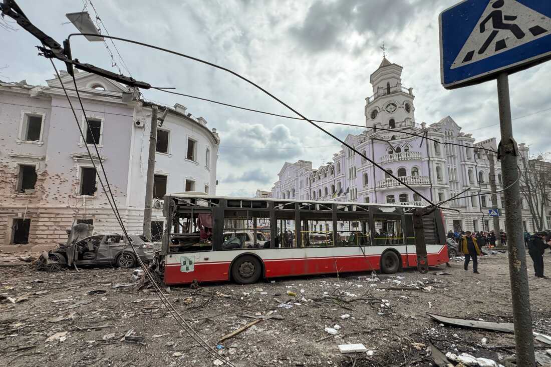 Rescuers work at the site of Russian ballistic strike on April 13, 2025 in Sumy, Ukraine.