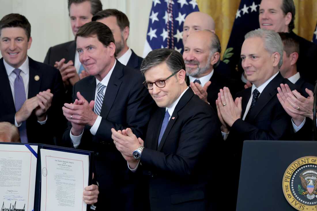 House Speaker Mike Johnson (R-La.) , along with lawmakers and administration officials applaud as President Donald Trump signs the “GENIUS Act” into law during a ceremony at the White House in Washington, D.C., on July 18, 2025.