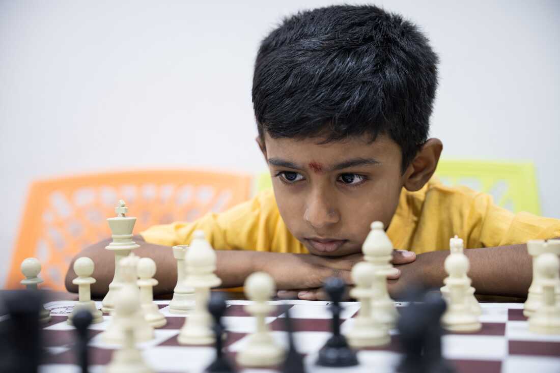 Seven-year-old Lakshan contemplates his next move at the Madras School of Chess in Chennai, India.