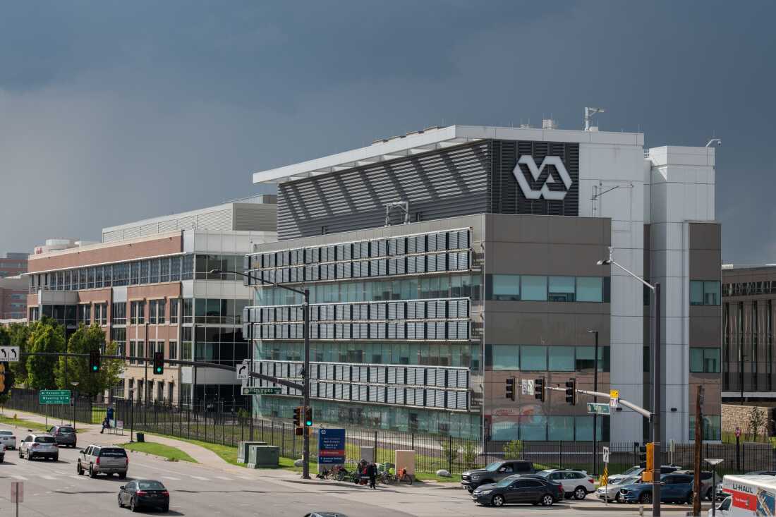 Cars drive by the Rocky Mountain Regional VA Medical Center in Aurora, Colo.