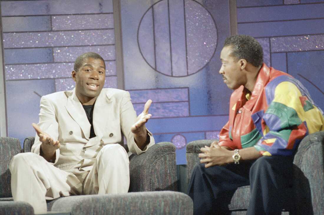 Magic Johnson, left, made his first public appearance on The Arsenio Hall Show after announcing he tested positive for HIV in Nov. 1991.