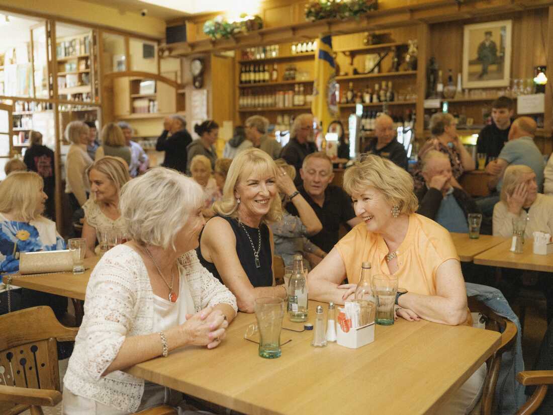 Geraldine Beirne, Nora O’Sullivan and Marie Walsh take a break from dancing in the Rathbaun Hotel during the Lisdoonvarna Matchmaking Festival in Lisdoonvarna, Ireland, on Sept. 27.
