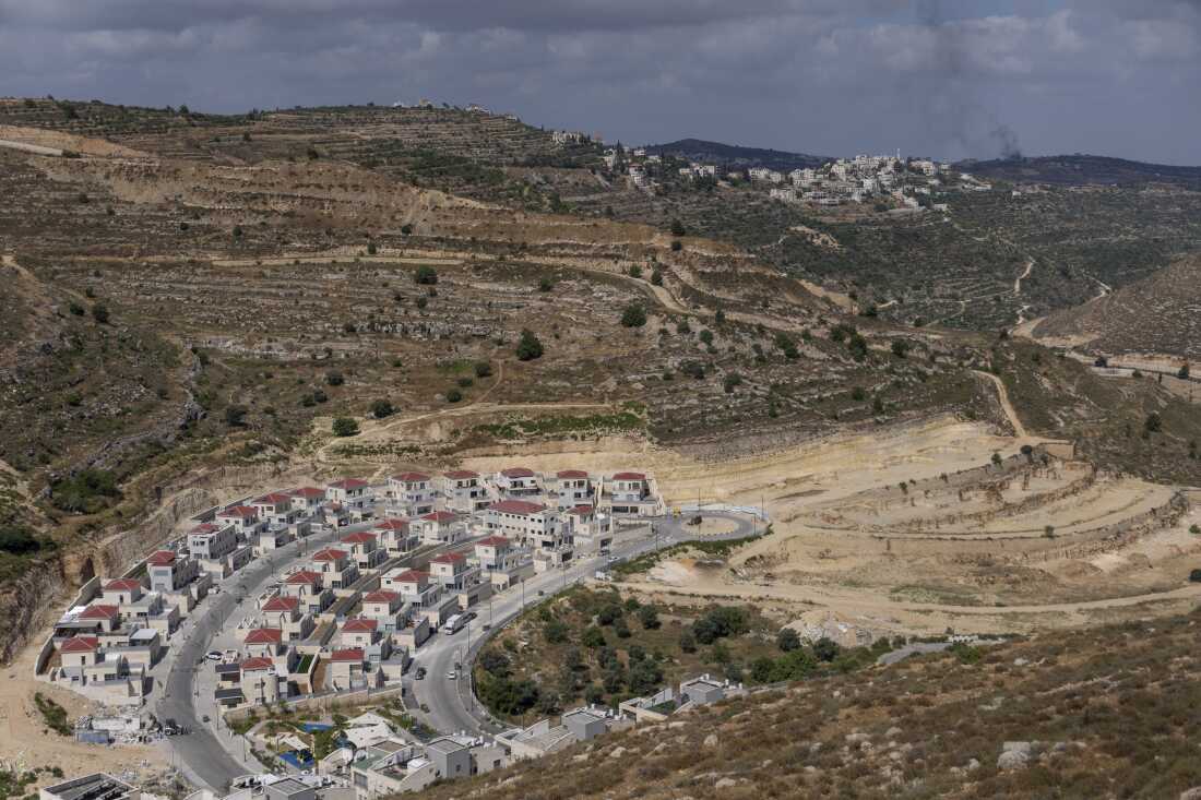 New housing projects are seen in the West Bank Israeli settlement of Givat Ze'ev, June 18, 2023. Evangelical Christians have supported the expansion of Israeli settlements.