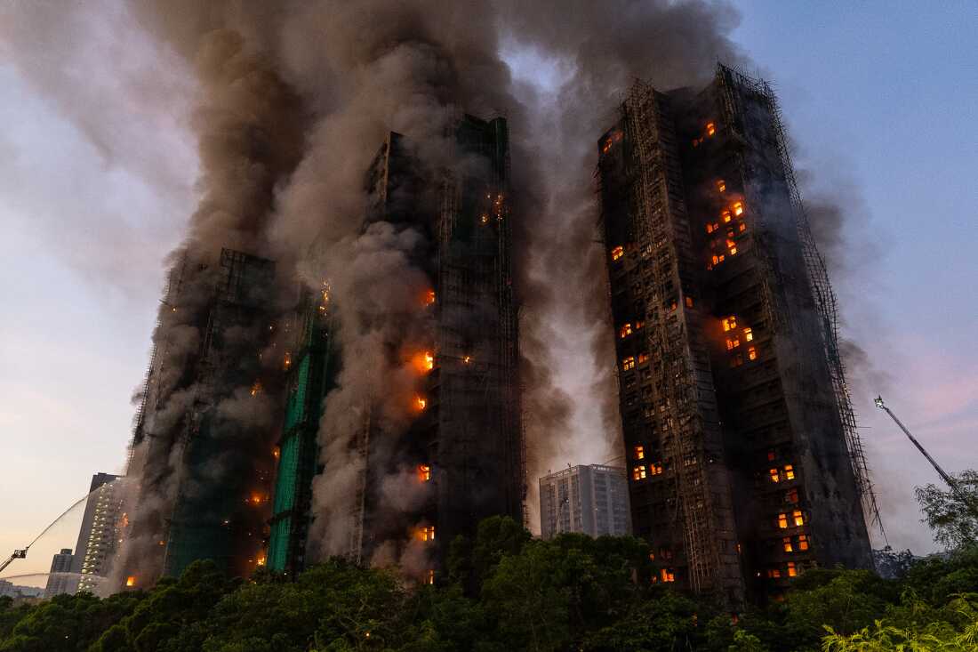 Smoke rises after a fire broke out at Wang Fuk Court, a residential estate in the Tai Po district of Hong Kong's New Territories on Wednesday, Nov. 26 2025.