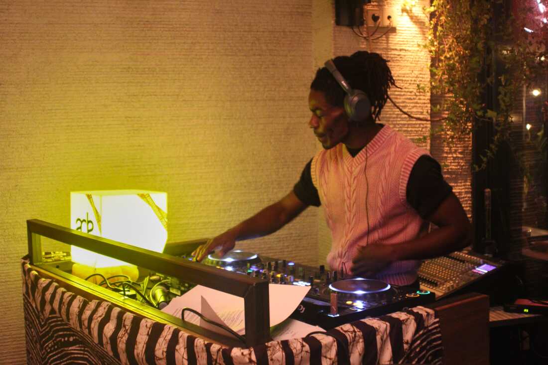 A DJ plays music at the "Break the Silence for Sudan" fundraiser at restaurant Van De Werf, during Amsterdam Dance Event, on Oct. 22.