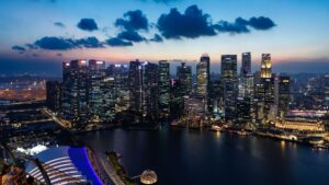Singapore Tightens Policy Again as Oil Risks Rise