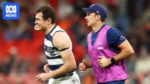 Geelong forward Jeremy Cameron after the heavy collision that caused a left shoulder injury