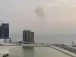 Explosions and smoke along Iran's southern coast amid reported US strikes and Iranian retaliatory attacks