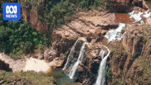 Road closure signs blocking access to Jim Jim and Twin Falls in Kakadu National Park during wet season