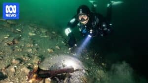 Fossil fragments scattered on the bottom of a Mount Gambier sinkhole (underwater cave)