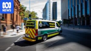 SA ambulance with paramedics at scene, representing response to priority 3 patients