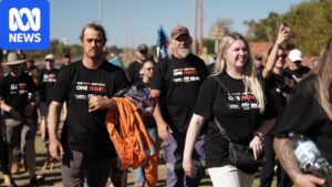 BHP workers walking off the job at Port Hedland during an eight-hour stoppage