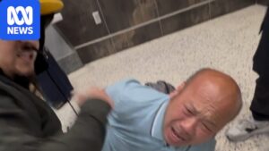 Footage of plain-clothes ICE officers pushing and handcuffing 57-year-old Phu Nguyen at Harry Reid Terminal 3 in Las Vegas