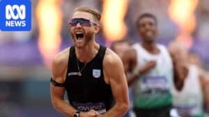 Josh Kerr celebrating after breaking the world mile record at London Stadium