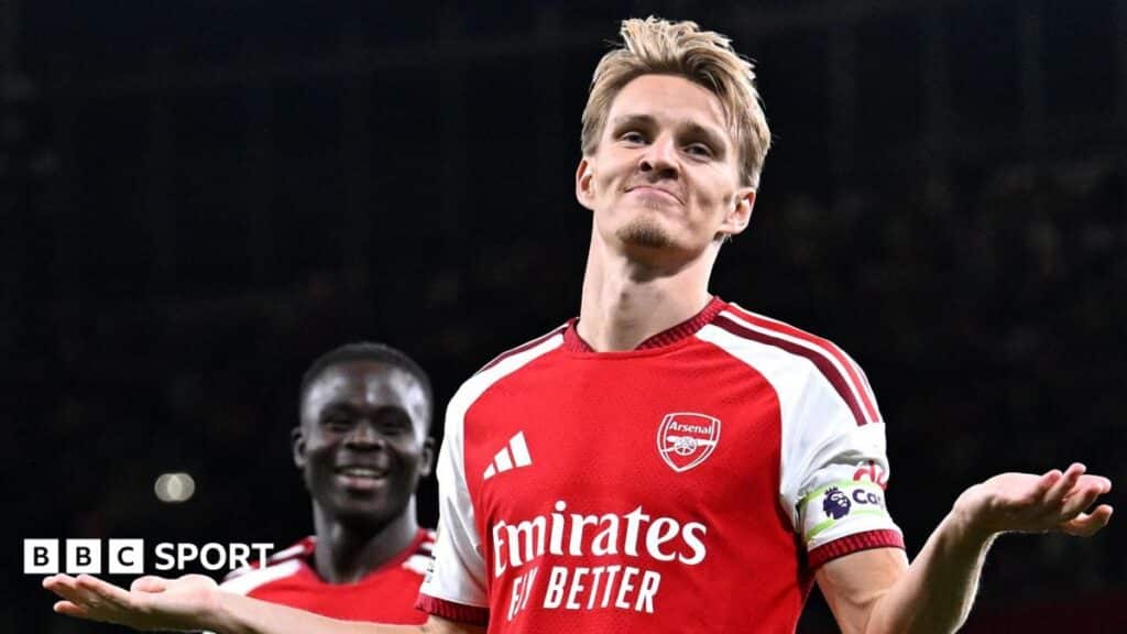 Arsenal open title defence with Coventry victory