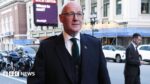 Swinney Defends World Cup Business-Class Flight Costs