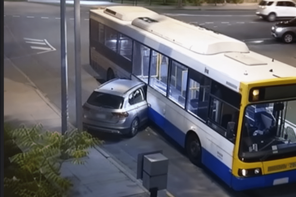 CCTV Shows Car Wedged in Brisbane Bus