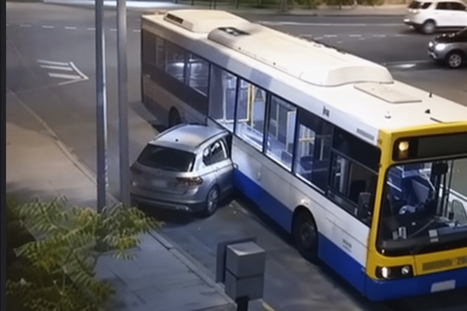 CCTV Shows Car Wedged in Brisbane Bus