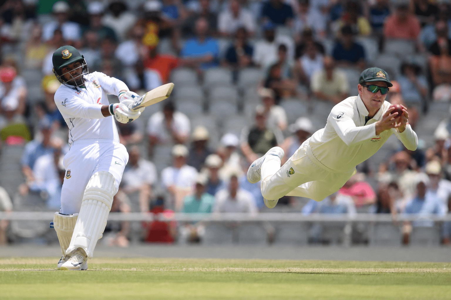 Tanzid century and Smith catches shape Darwin Test