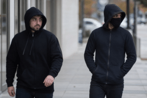 Two men remain sought after bracelet removals