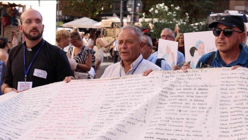 Rome Priests Carry Shroud Naming Children Killed