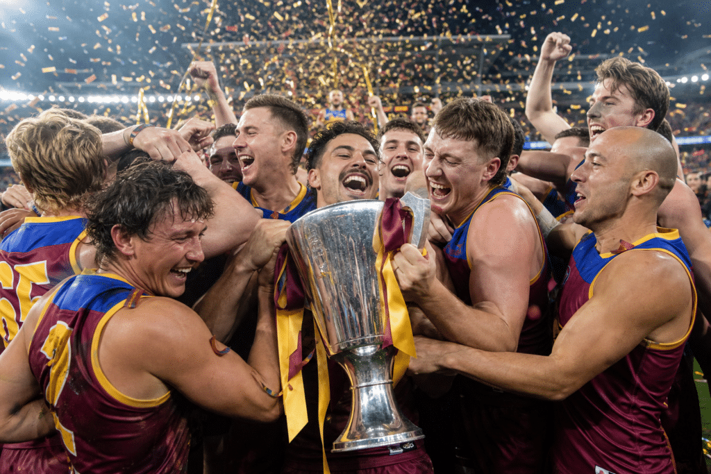 Lions rally late to secure third straight AFL premiership
