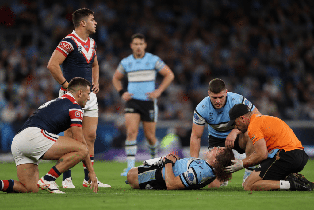 Roosters Lead Sharks After Hynes Concussion