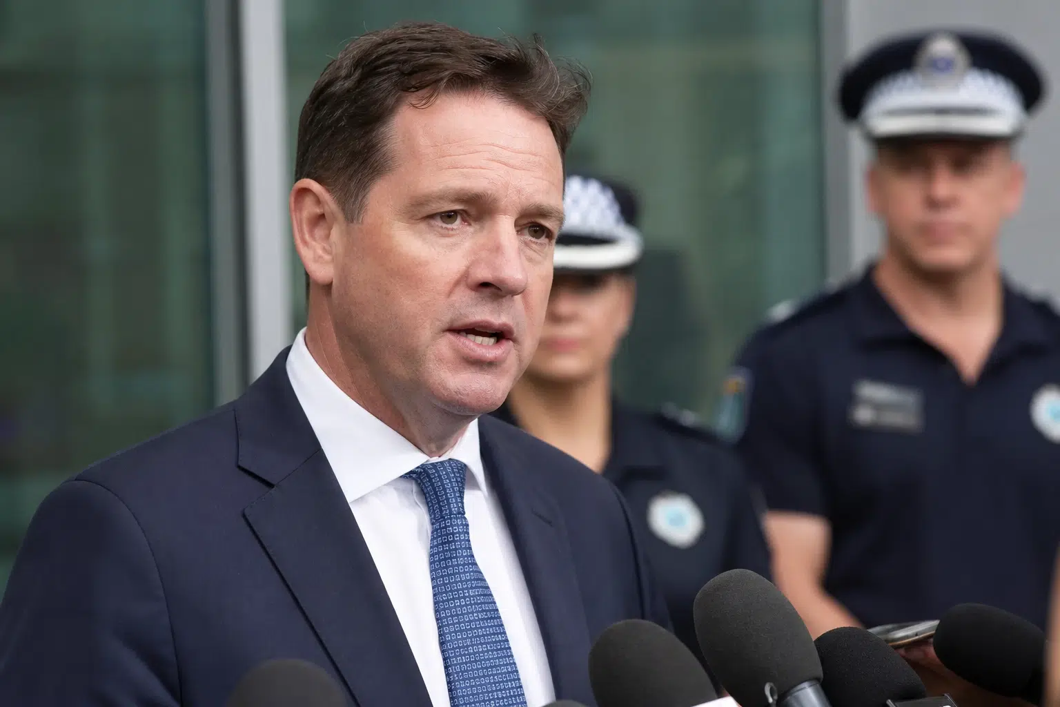 Cox says Sydney bans will stand through police inquiry