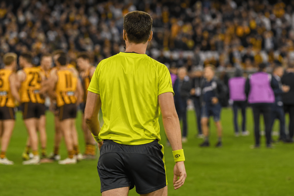 AFL umpire reports threats after Hawks final